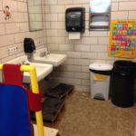 State mandated preschool shares bathroom facilities with girls locker room